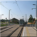 A northbound tram crossing Ruddington Lane