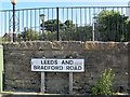 Sign for Leeds and Bradford Road, LS28