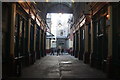 View along a passageway in Leadenhall Market towards 85 Gracechurch Street