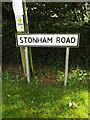 TM0766 : Stonham road sign by Geographer