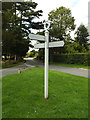 TM0766 : Roadsign on Church Road by Geographer