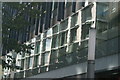 View of a reflection of new apartments on Sumner Street in the Blue Fin Building