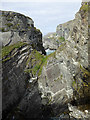V7323 : The chasm at Mizen Head by Oliver Dixon