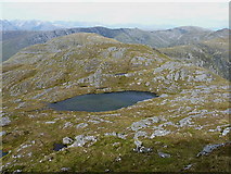 NH0441 : Looking down the north ridge of Bideain a' Choire Sheasgaich by Richard Law