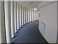 TQ2581 : Curving corridor, Hallfield Primary School by David Hawgood