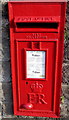 Queen Elizabeth II postbox in a High Street wall, Abersychan