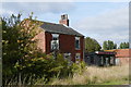 Derelict tavern and farm shop