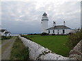 NS1367 : Lighthouse at Toward Point on the Cowal peninsula by John Ferguson