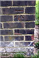 Benchmark on Flats #112-122 Brighton Road