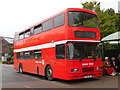 A double decker bus outside Millets Garden Centre