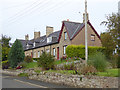 NT9053 : Row of cottages in Hutton village by Oliver Dixon