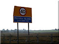 TM0114 : Mersey Island sign on the B1025 The Strood by Geographer