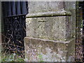 Nineteenth-century benchmark on gate pier