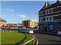 Yellow self storage building on Queens Road Sheffield