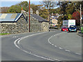 The A 496 road sweeps through Tal-y-bont