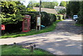 Postbox, phonebox and parish noticeboard, Burleigh