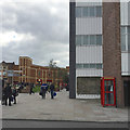 Rear of Primark store with inscription and phone box, Ironmonger Row, Coventry