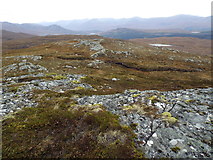 NH2619 : Rocky ground on Carn a' Choire Leith in Guisachan Forest by ian shiell
