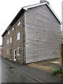 Wooden sided housing in  Caersws