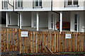 A timber boundary fence at Livingston Place, Galashiels