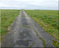 TL3075 : Former public road on Wyton Airfield by Richard Humphrey