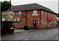 Direction sign near a Gravel Hill One Stop shop, Ludlow