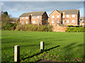 Apartment buildings across grassed space