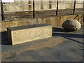 Concrete form and bench at the base of the Heugh Breakwater