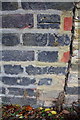 Benchmark on Longfield Walk face of #43 Carlton Road