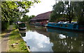 Narrowboats moored along the Grand Union Canal