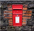 Queen Elizabeth II postbox in a Snatchwood wall, Abersychan