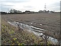 SE6364 : Waterlogged stubble field near Sheriff Hutton Bridge Farm by Christine Johnstone