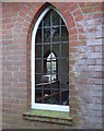 Looking through the windows of the church on Loxwood Road