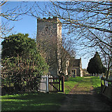 TL3635 : Reed church and churchyard gate by John Sutton