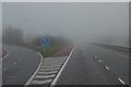 J0258 : The M1 eastbound at junction 11 by Ian S