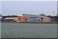 Bellingham Leisure Centre, seen across frosty playing fields