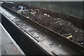 View of a rubbish barge on the Regents Canal