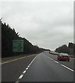 TL6366 : A14 Newmarket Road & roadsign by Geographer