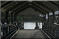 View looking into Cadogan Pier through the railings