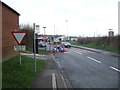 TA1079 : Bus stop and roadworks on King Hill, Muston by JThomas