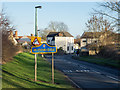 Grass verge with road signs