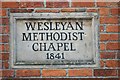 Dedication stone, former chapel