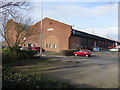 SJ3487 : Warehouse/business premises alongside the in-filled Toxteth Dock by John S Turner