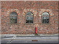 Three windows in the former Toxteth Dock warehouse