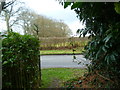 Footpath reaches Horsham Road from the west