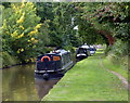 Narrowboats moored along the Coventry Canal