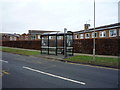 Bus stop and shelter on North Leas Avenue