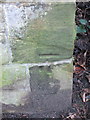 SD2806 : Bench mark on St Luke's churchyard wall by John S Turner