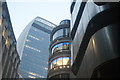 View of the Walkie Talkie, Roderick Charles clothing shop and the Lloyds Building from Leadenhall Street