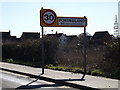 TG2503 : Poringland Village Name sign by Geographer
